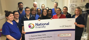 National Friendly staff and NICU nurses hold large cheque