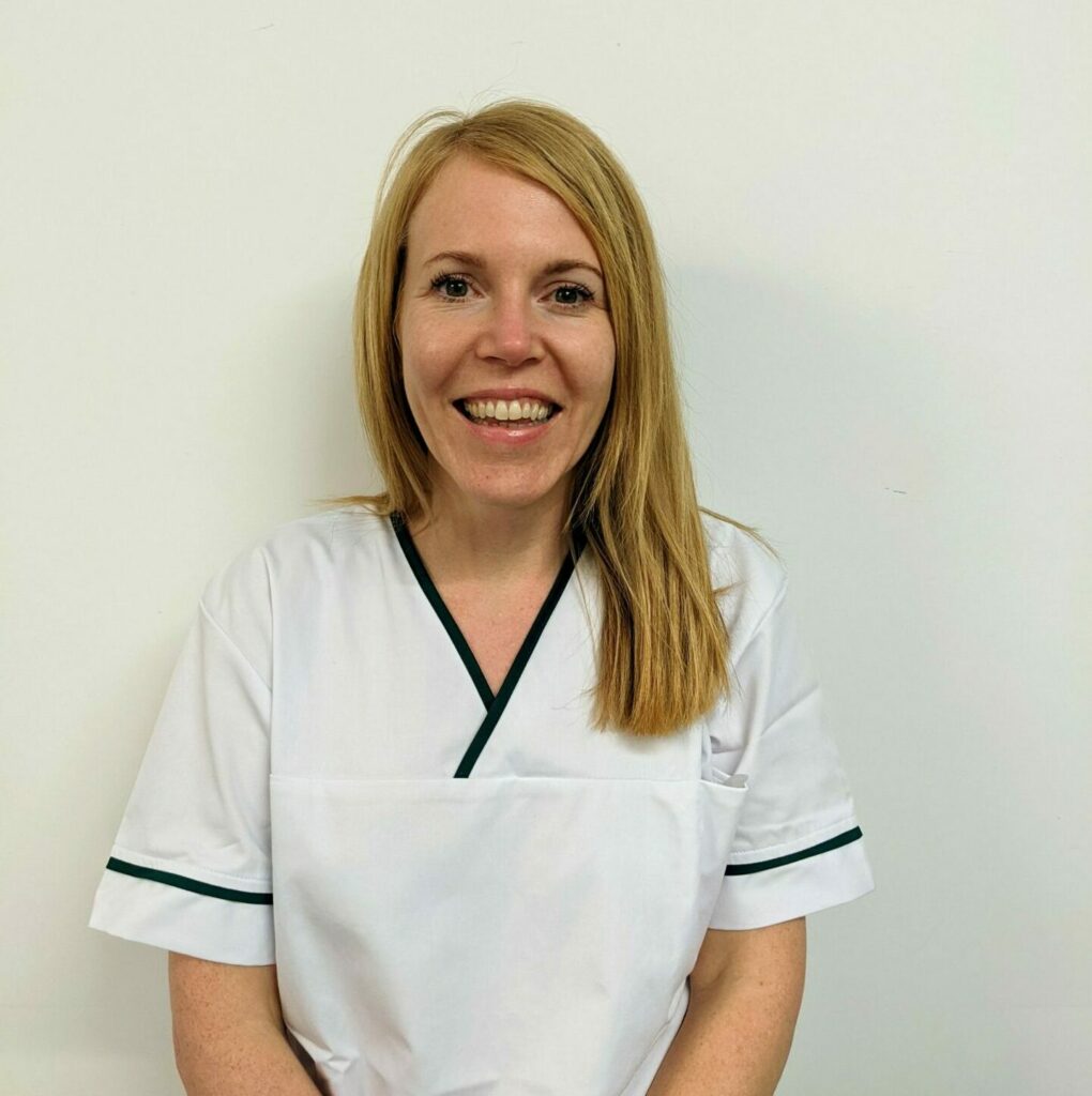 A smiling picture of Helen, a member of the Occupational Therapy team